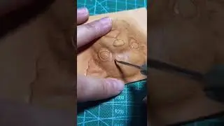 The exquisite craftsmanship of leather carving art not only brings the dog’s image to life but