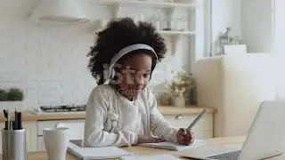 Cute African School Girl Elearning With Online Tutor At Home Stock Video   Download Video Clip Now