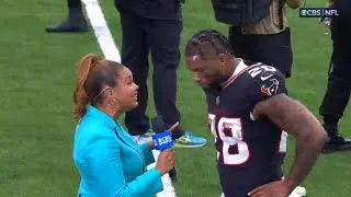 Joe Mixon speaks to AJ Ross after the win over the Colts.