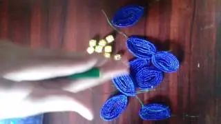 Бисерден күнбағыс ретінде гүл жасау.