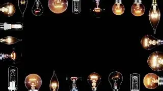Many Edison lamps blinking over black, copyspace frame, looped video