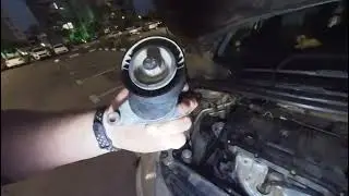 Replacing the alternator belt tensioner on a Peugeot 307