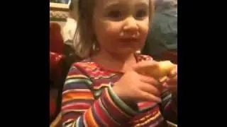 Evie eating a lime