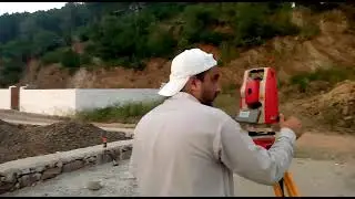 Making the total station ready for surveying.
