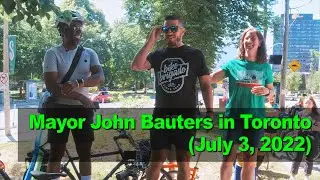 Riding with mayor John Bauters in Toronto