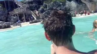Swimming in the warm waters of Tulum, Mexico