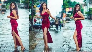 a beautiful  Woman pulling herself out of muddy floodwaters