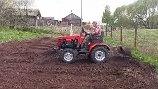 Самодельный: трактор и грейдерный отвал в деле