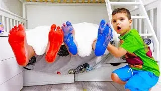 Egor and Yarik play with paints