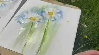 Painting backgrounds to loose watercolor daisies #artteachertips #watercolorpainting #learntopaint