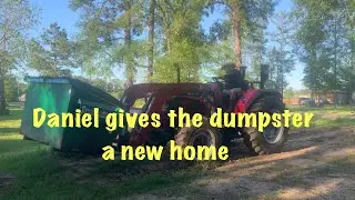 Daniel gives the dumpster a new home