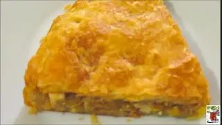 Пирог с капустой и яйцом из слоёного теста