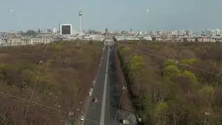 AERIAL: Strasse des 17. Juni with View on Brandenburg Gate in Berlin, Germany on Sunny Day