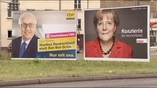 Merkel pide el voto a los simpatizantes liberales en un fin de campaña igualado