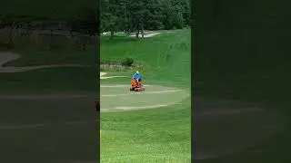 How golf greens get so smooth.   A small version of an asphalt double steel roller.