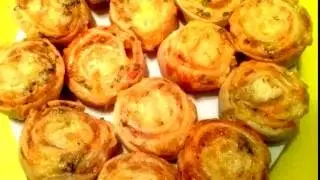 Рулетики с колбасой и сыром из слоёного теста