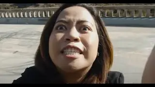 Asian Lady Eats Dog