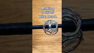 Making a silver wire Celtic knot bead.