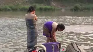 The girl take a bath at Namkham river ( Luang Prabang laos )