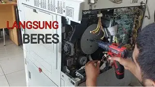 mesin fotocopy bunyi kasar di belakang