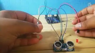 Doing a testing of Ultrasonic sensor with 2 led lights