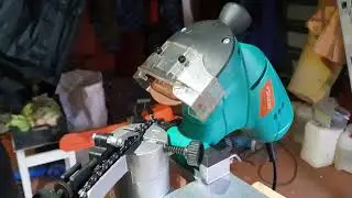 Sharpening a chainsaw chain with a sturm@ machine.