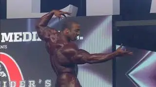 Cedric McMillan Posing at 2018 Mr. Olympia Finals