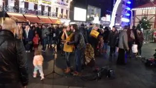 People singing on Leicester Square