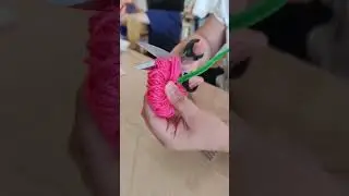 Create everlasting flowers using colourful yarn.