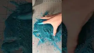 Mixing slime on my table by hand