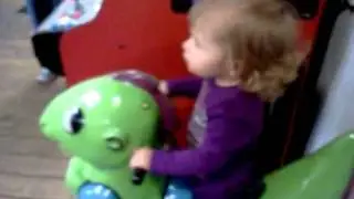 Roxie on mechanical dinosaur