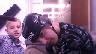 Target practice on a toy SWAT helmet