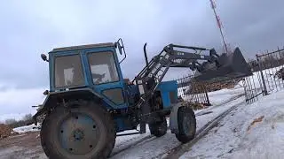 Работа трактора МТЗ 80 с фронтальным погрузчиком Metal Fach T219  на заготовке дров.