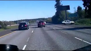 I205N 4-18-2024 Reckless White Honda/Toyota WA plates spins out, loses control passing on shoulder