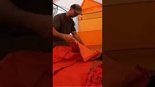 Inflating the Big Agnes Air Core Ultra Air Pad with provided inflation sack.