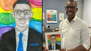 Curtis Ennis, HDSB Director of Education, receives student-drawn portrait