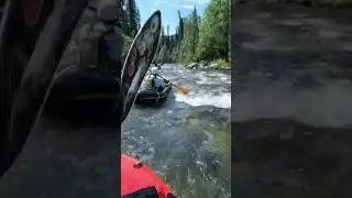 Mountain stream packrafting 