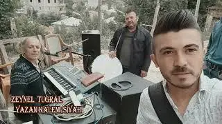 Zeynel Tuğral Yazan kalem siyah Kerem Foto