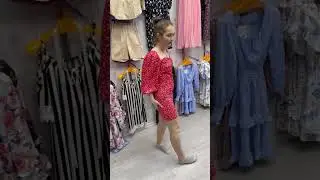 Russian girl fitting red dress 