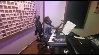 Pitit mwen a 7ANS  kap jwe Piano titre music la: Over The Rainbow/Harold Alen Alfred's Music book  V
