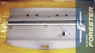 Disassembling the Subaru Forester SF's cargo cover