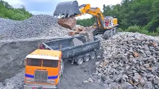 WORLD'S HEAVIEST Stones Loaded by Komatsu HD 405 4x4 and Liebherr R970!