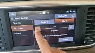 How to adjust touchscreen brightness in Kia Sportage