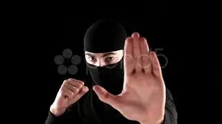 Ninja Says Stop On Black Background. Stock Footage