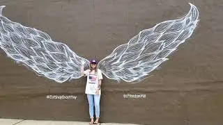 Take a Photo with our Wing Mural