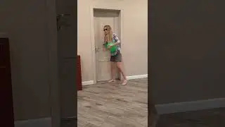 Tanya takes off the mask from a big fat dog