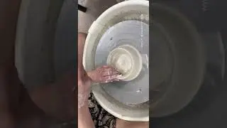 Bird's eye view of pottery throwing a little dumpling dish