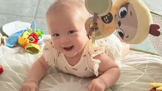 Baby and mommy at the camera
