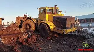 Трактора К-701, МТЗ и КАМАЗ работают в колхозе зимой.