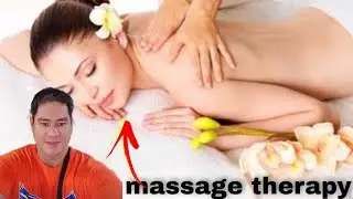WOMAN ENJOYING BODY MASSAGE